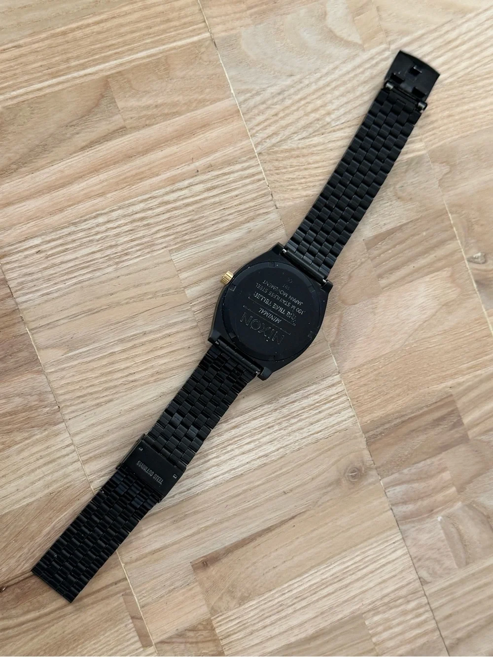 Nixon Minimal The Time Traveler Black Stainless Case Bracelet Gold Hands Markers